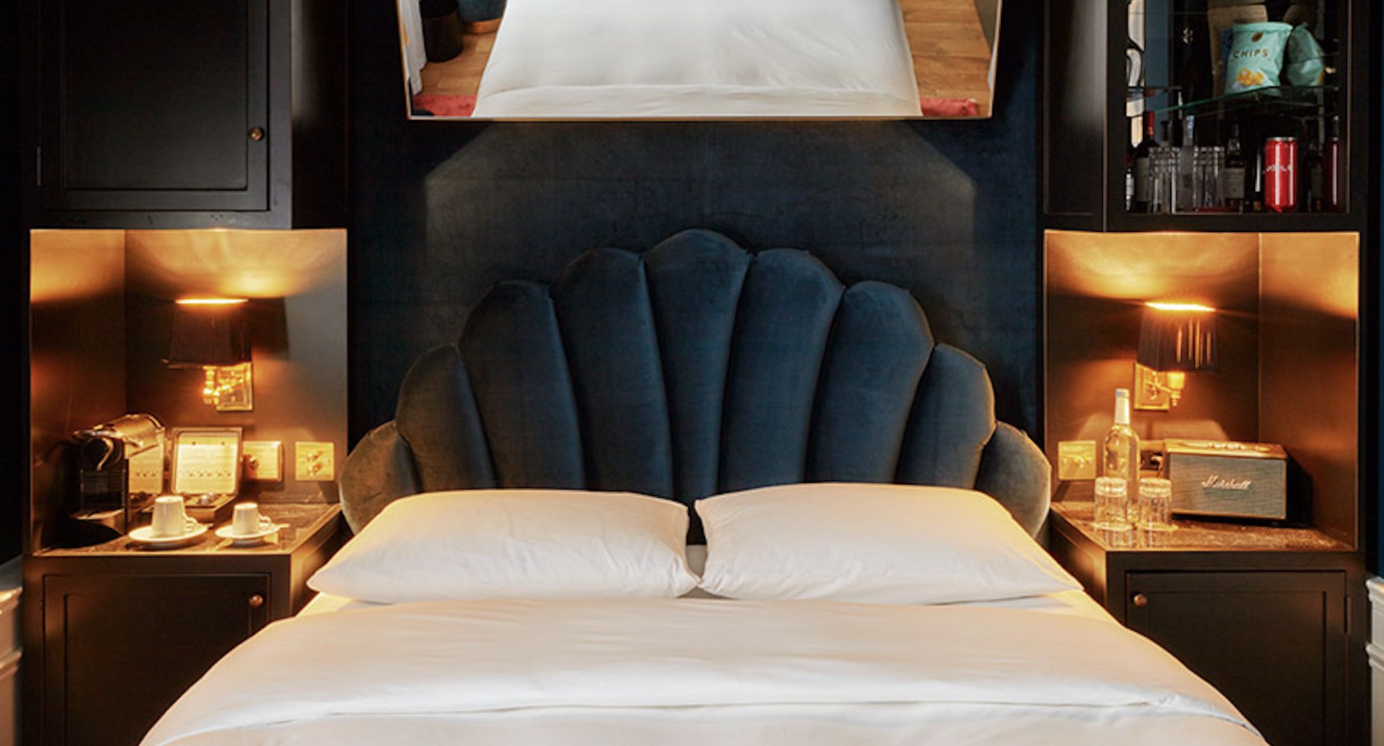 Provocateur Hotel is one of the top boutique hotels in berlin, shown here with classy king bed room