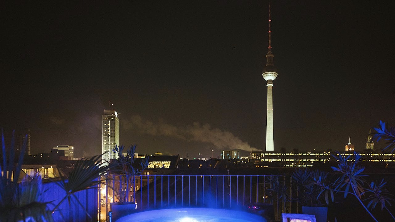 Weinmeister Berlin-Mitte rooftop hot tub at night in one of the coolest hotels in Berlin